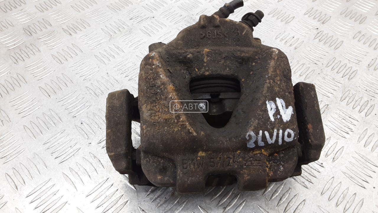 Суппорт тормозной передний левый