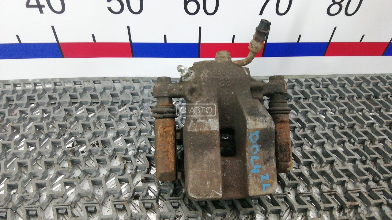 Суппорт тормозной задний левый