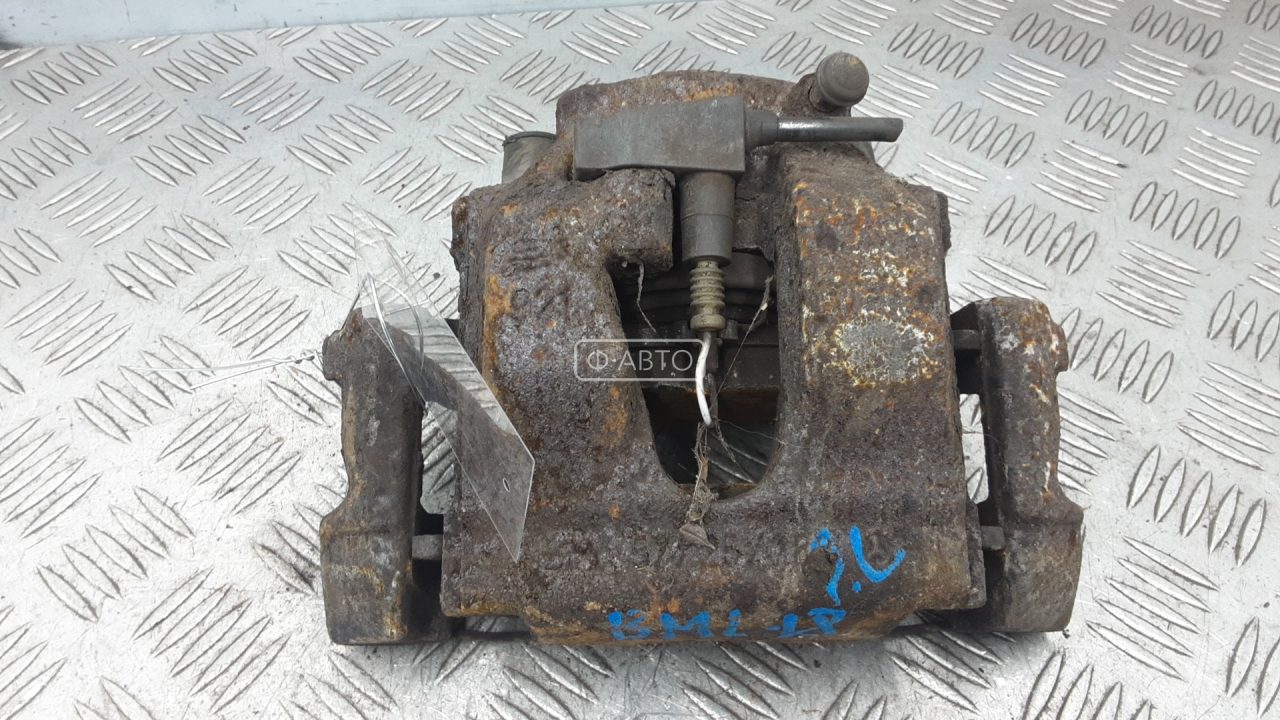 Суппорт тормозной передний левый