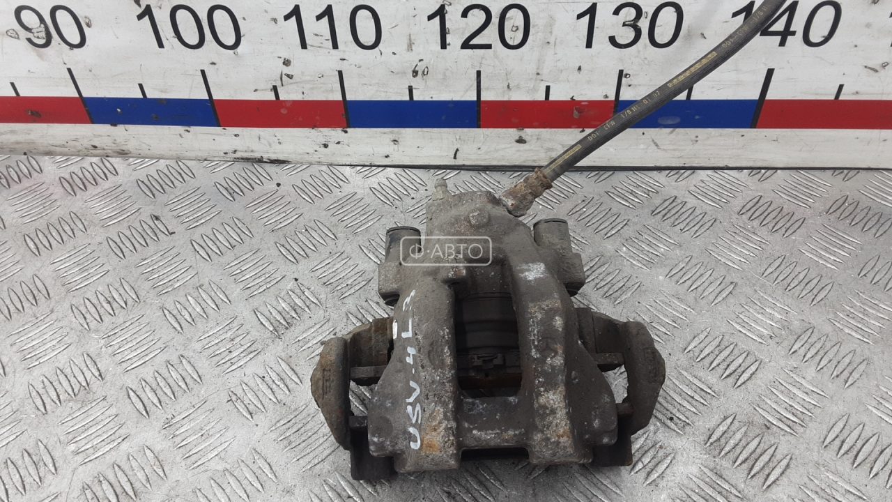 Суппорт тормозной задний левый