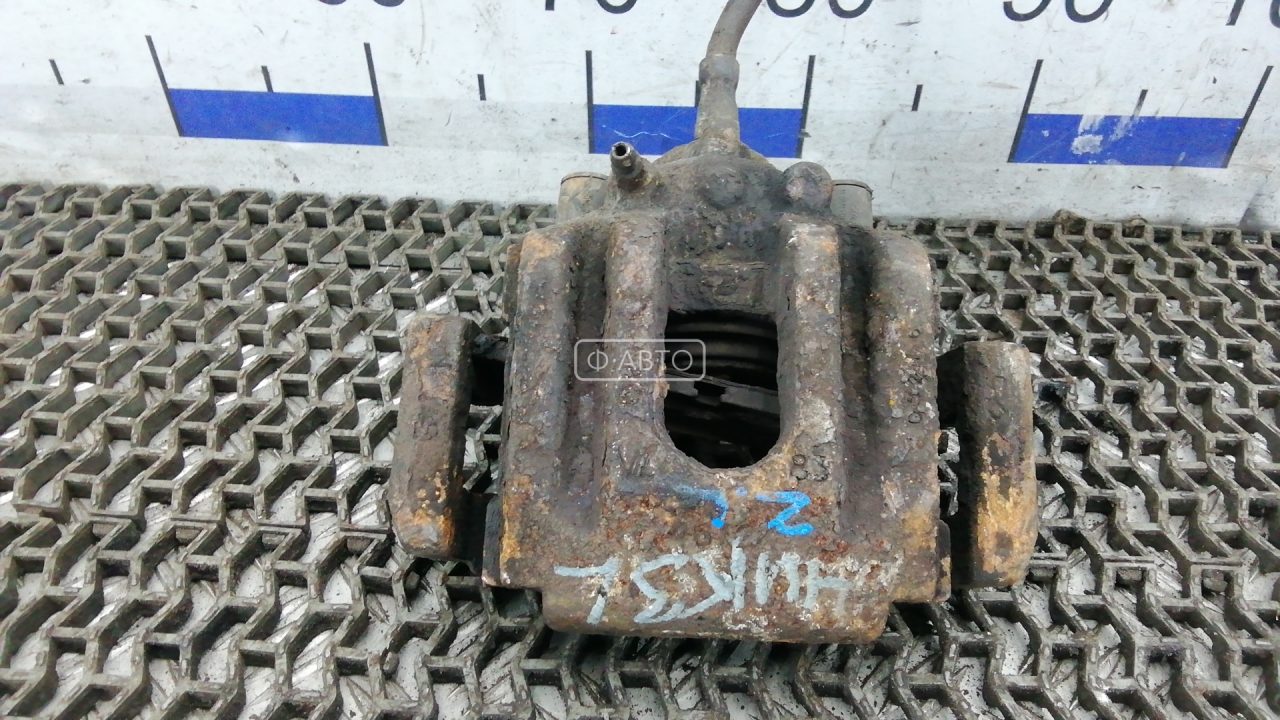 Суппорт тормозной задний левый