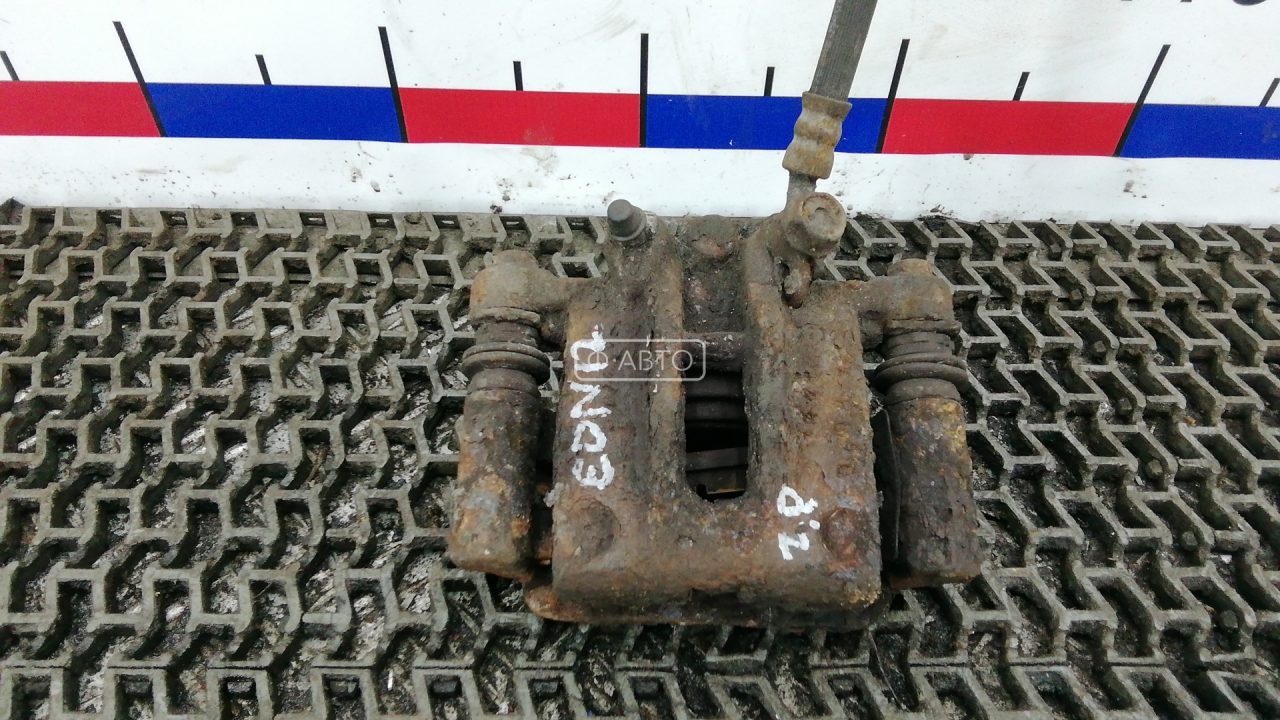 Суппорт тормозной задний правый