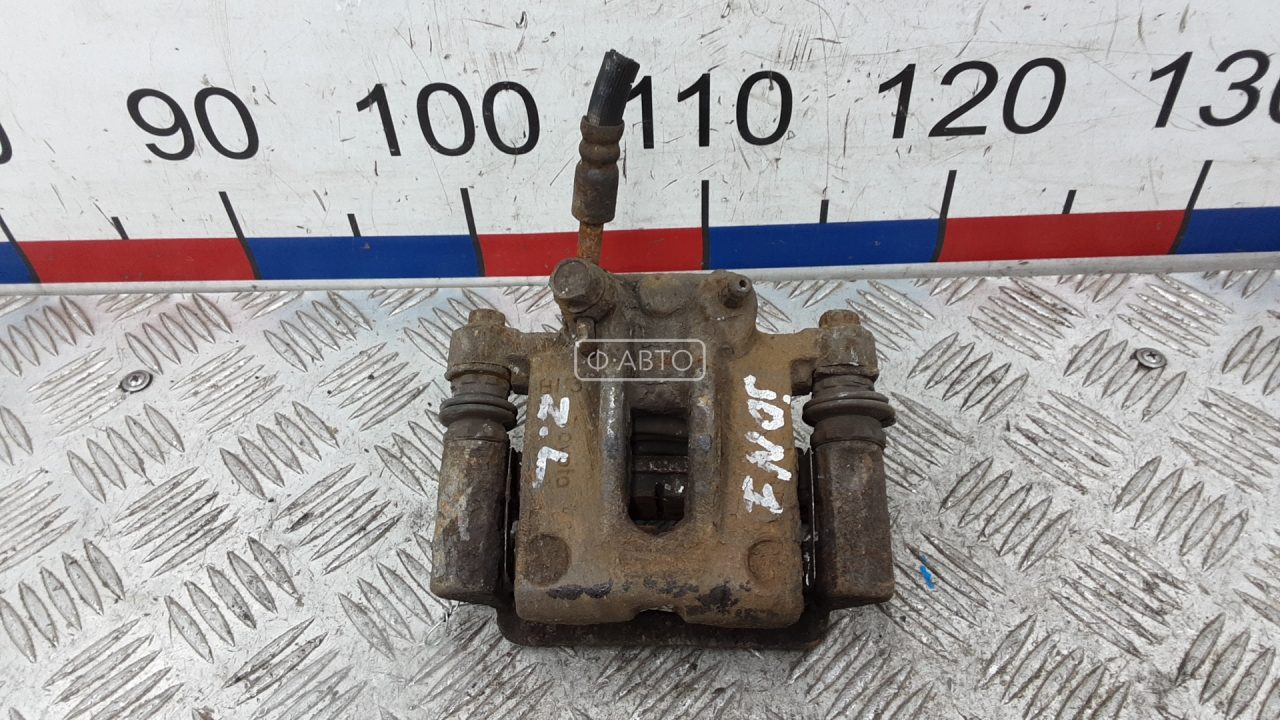 Суппорт тормозной задний левый