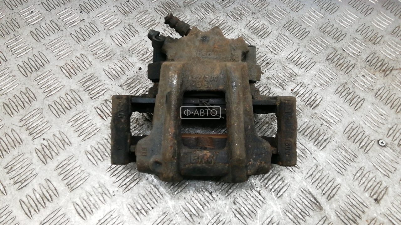 Суппорт тормозной передний левый