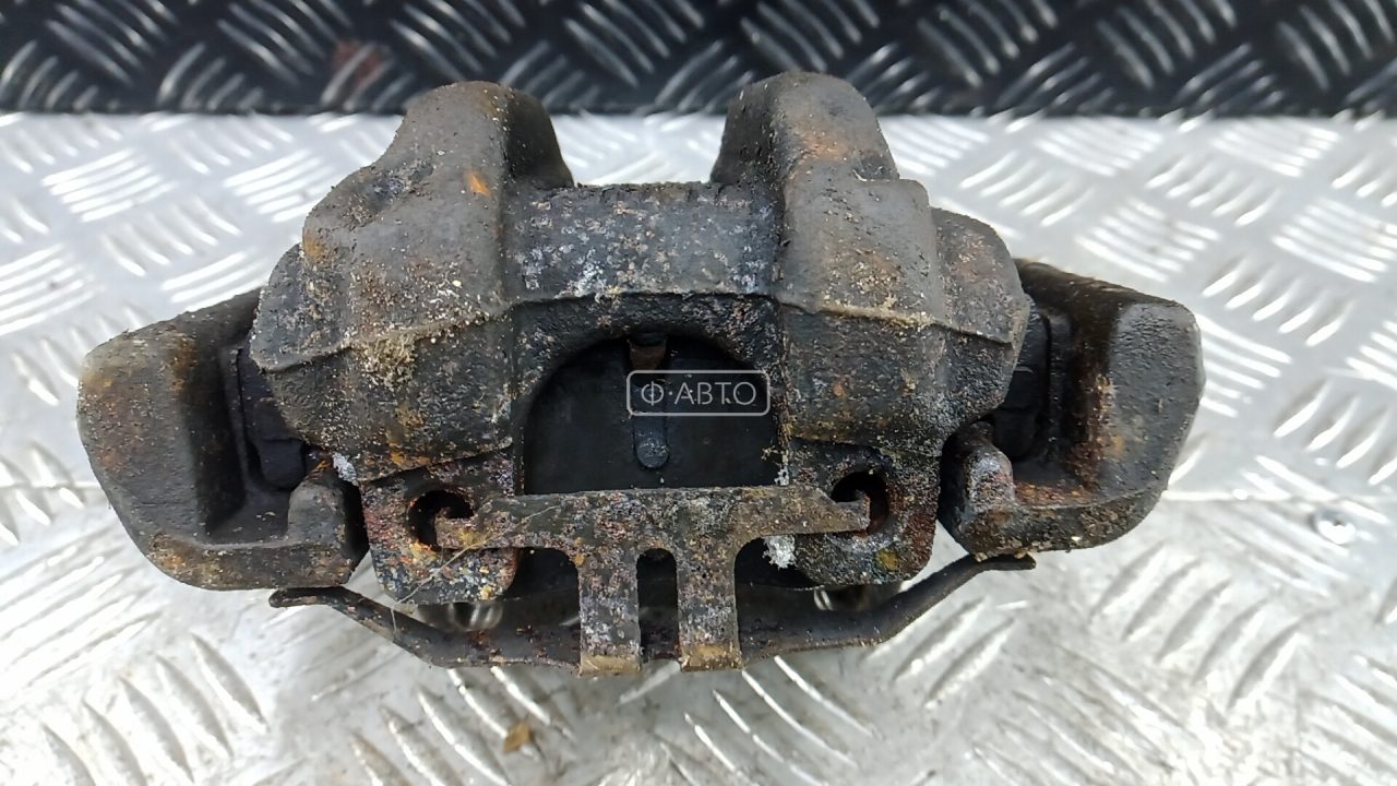 Суппорт тормозной задний левый