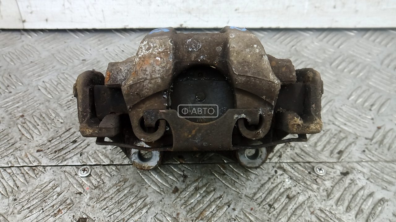 Суппорт тормозной задний левый