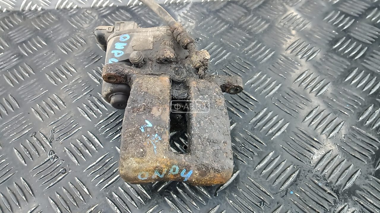 Суппорт тормозной задний правый