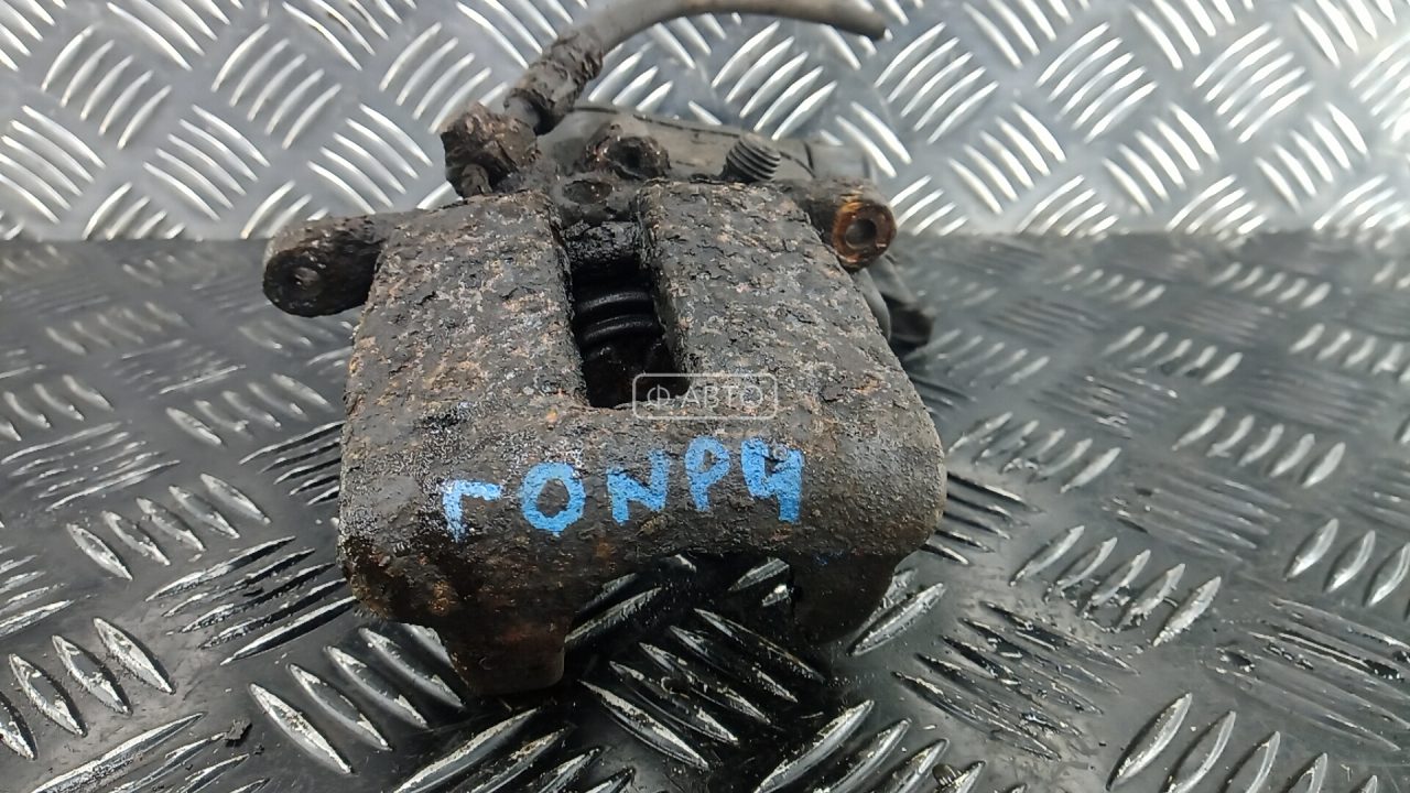 Суппорт тормозной задний левый