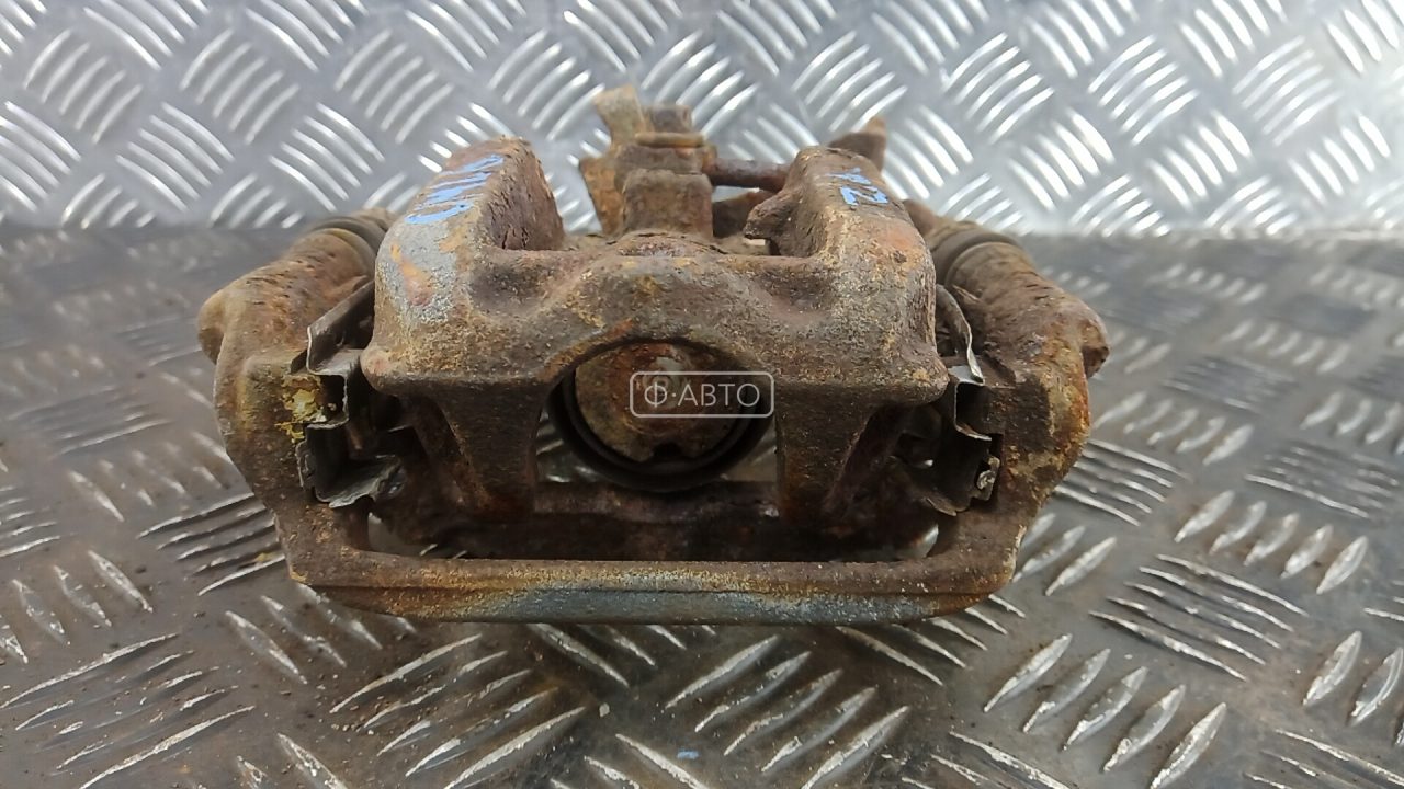 Суппорт тормозной задний левый