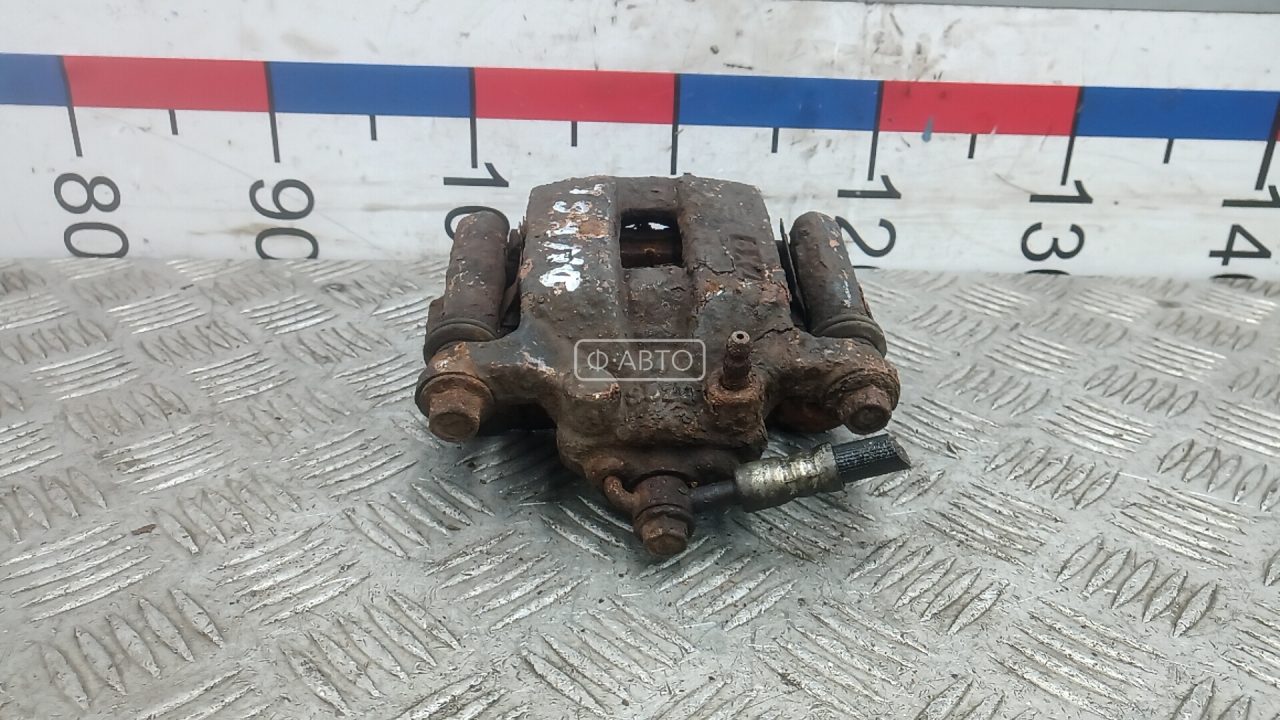 Суппорт тормозной задний левый