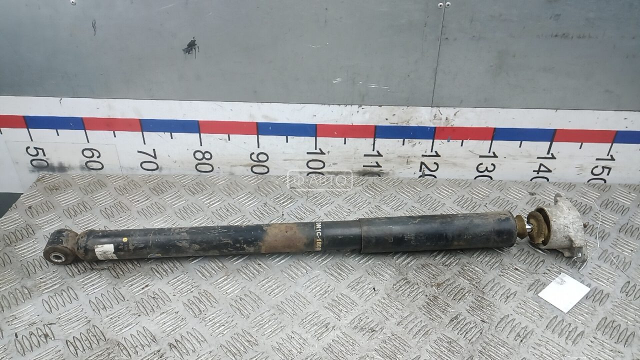 Амортизатор задней балки