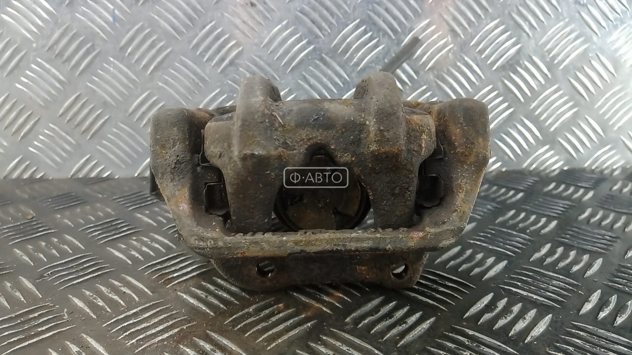 Суппорт тормозной задний левый