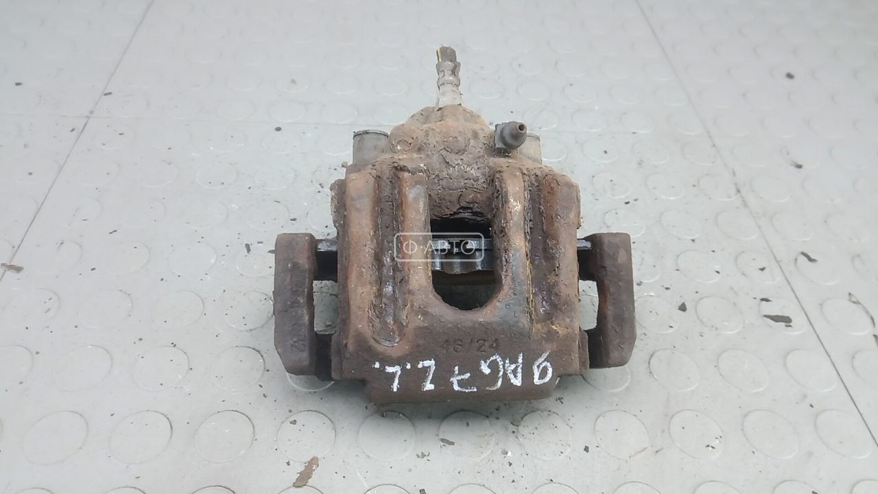 Суппорт тормозной задний левый