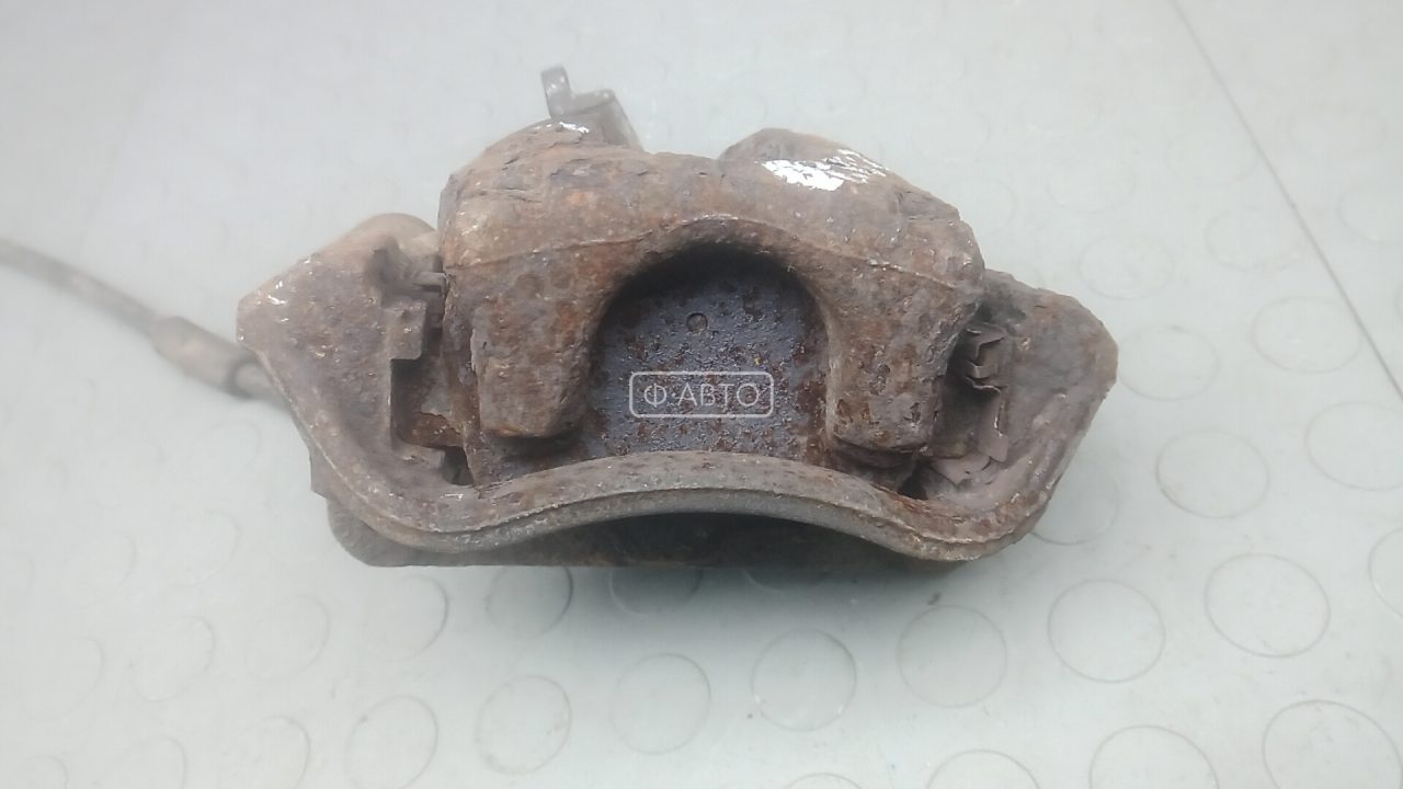 Суппорт тормозной задний левый