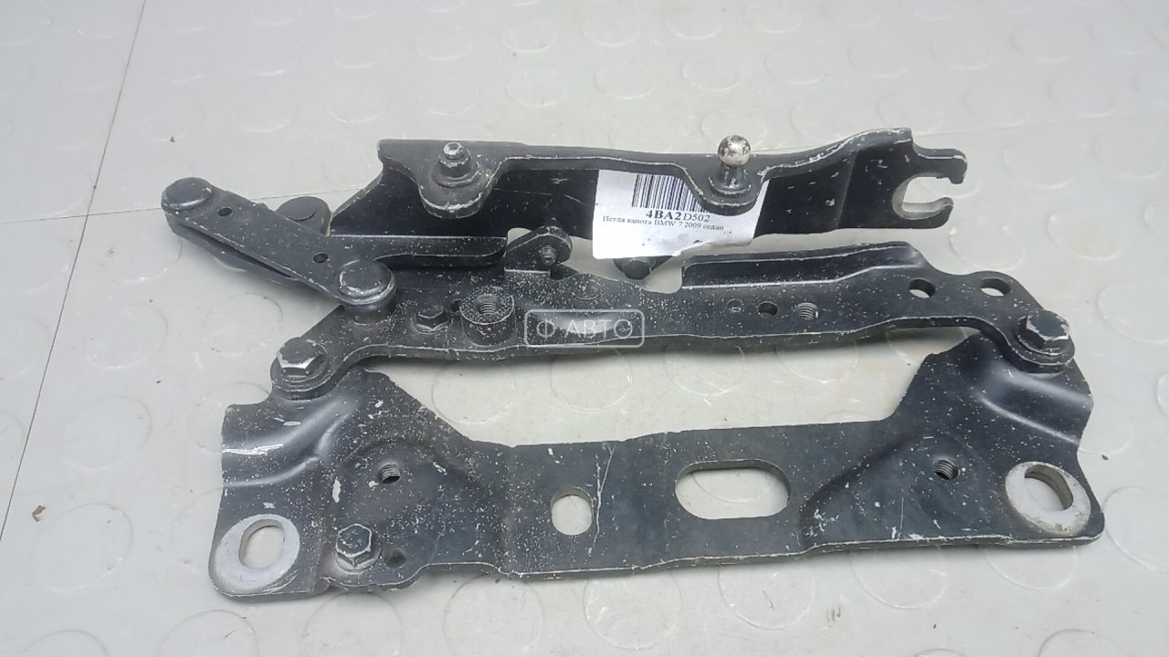 Петля капота