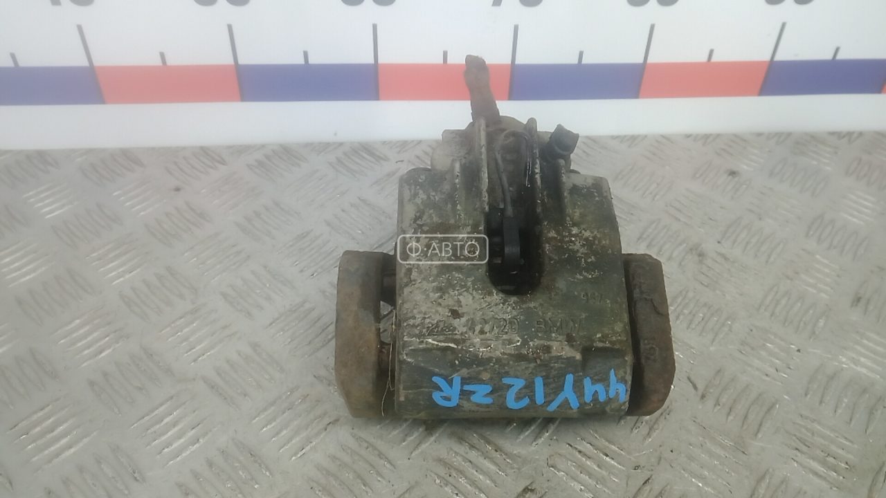 Суппорт тормозной задний правый