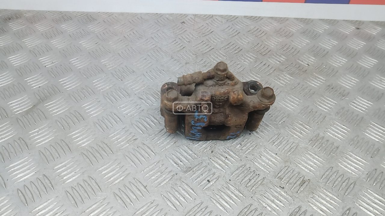 Суппорт тормозной задний левый