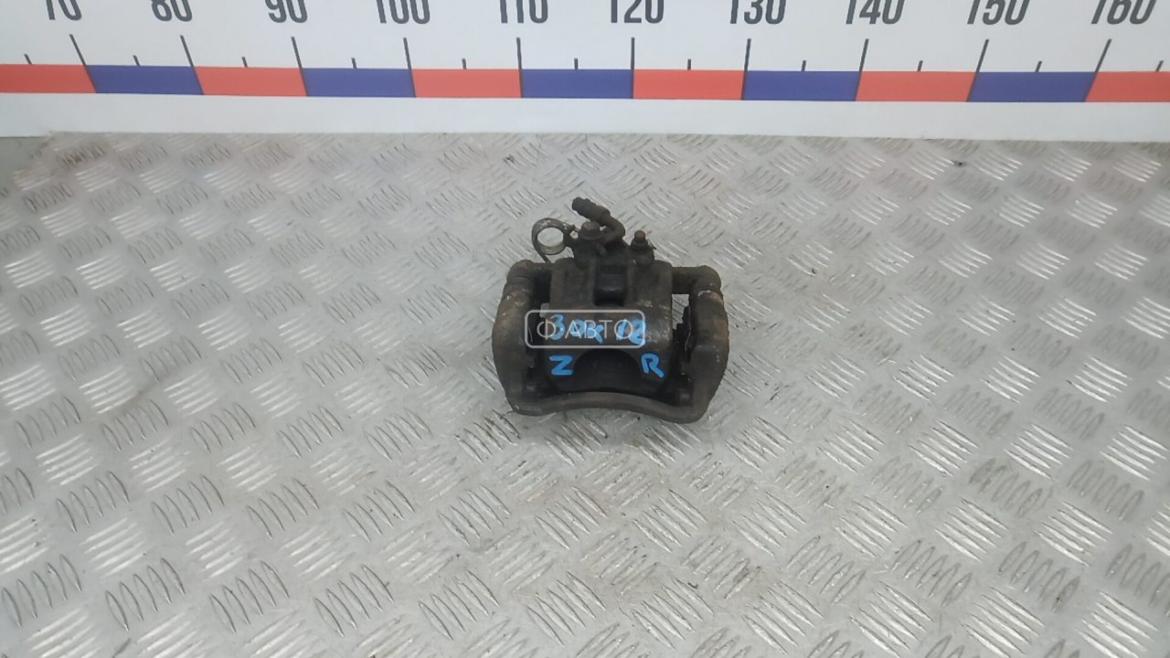 Суппорт тормозной задний правый