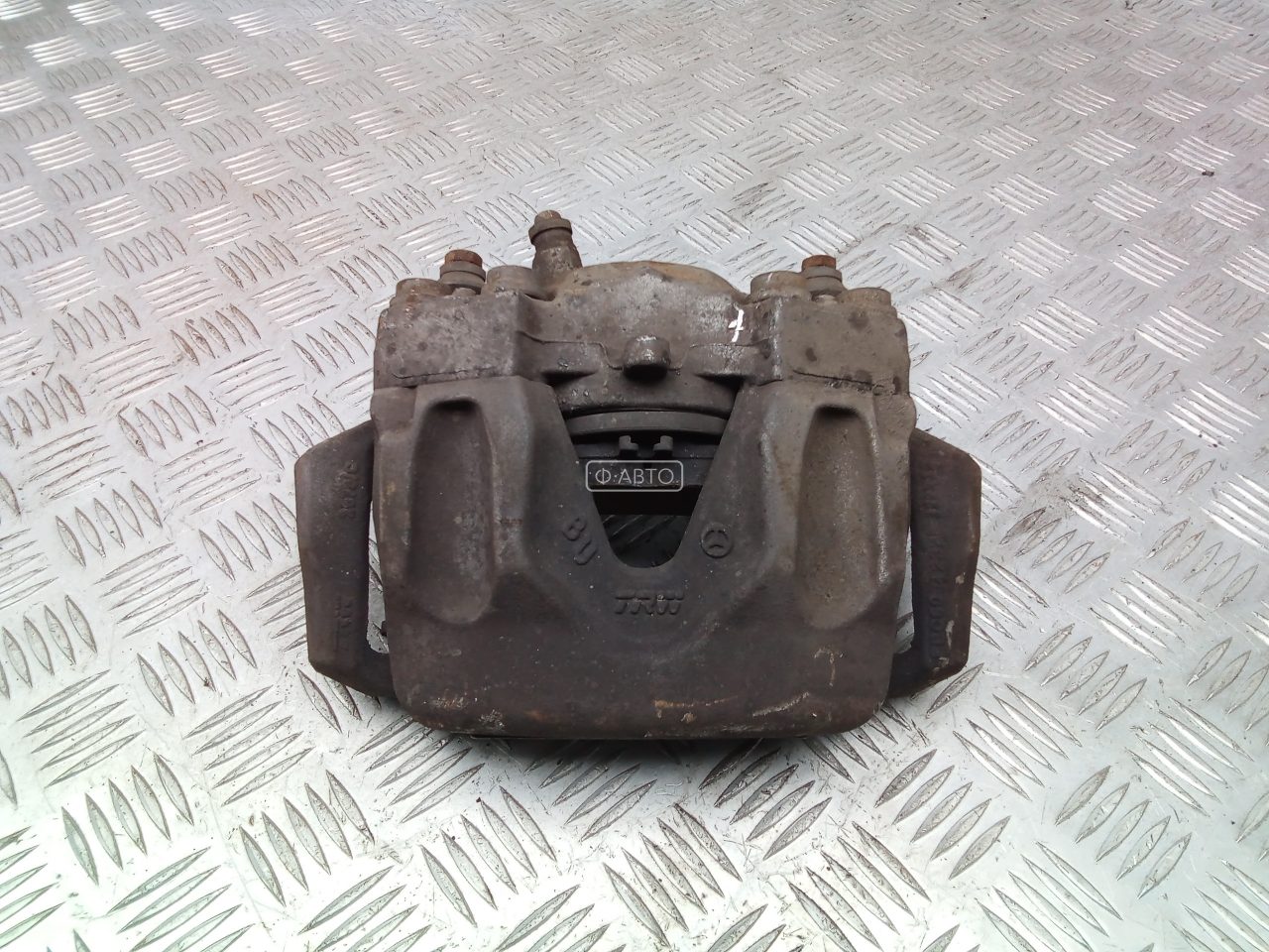 Суппорт тормозной передний левый