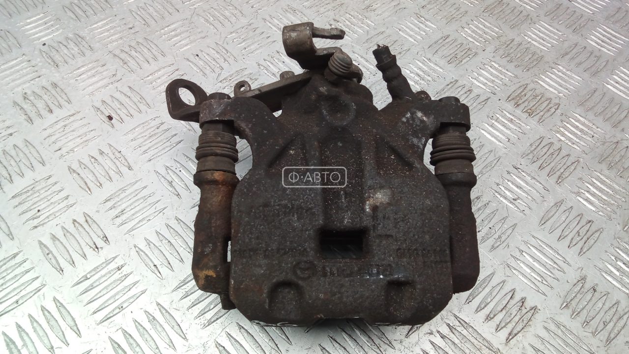 Суппорт тормозной задний левый