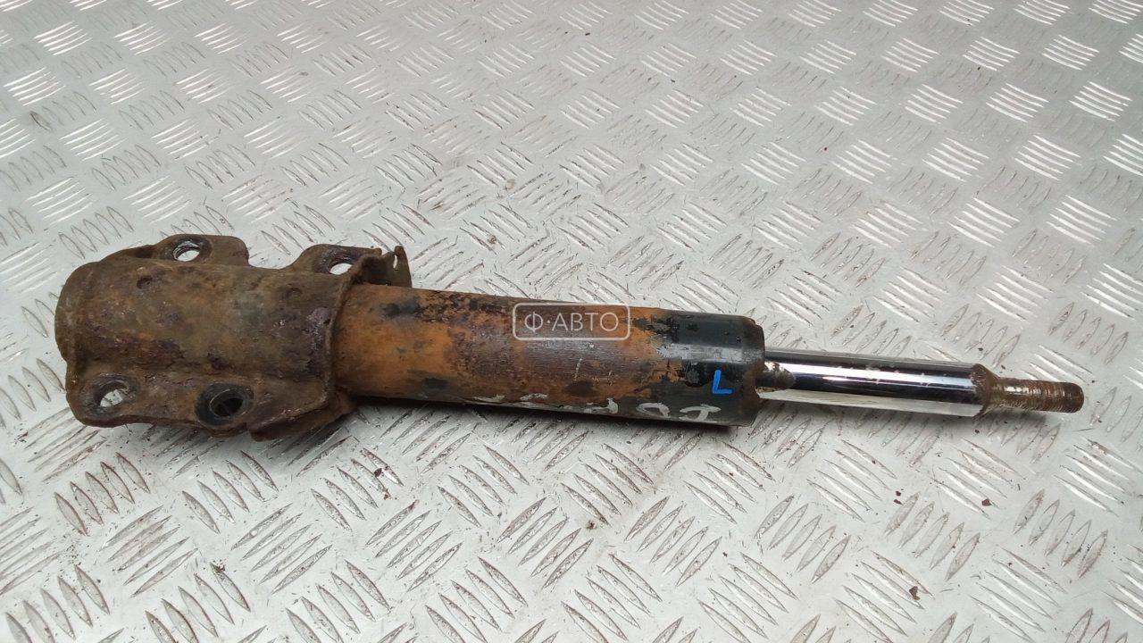 Амортизатор передний левый