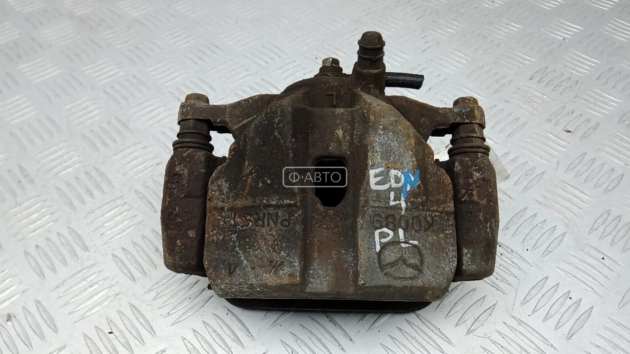 Суппорт тормозной передний левый