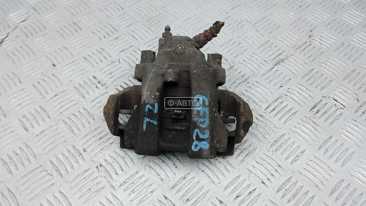 Суппорт тормозной задний левый