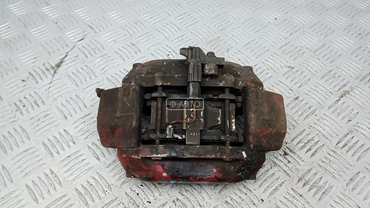 Суппорт тормозной передний левый