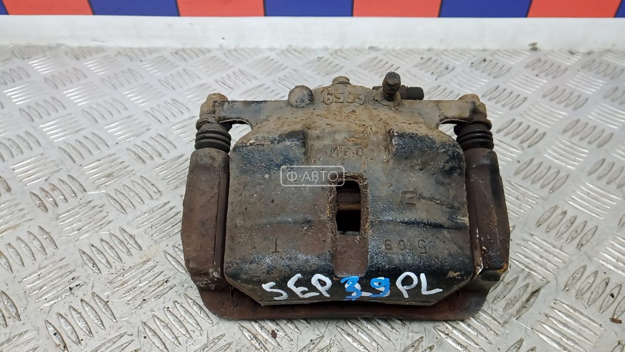 Суппорт тормозной передний левый