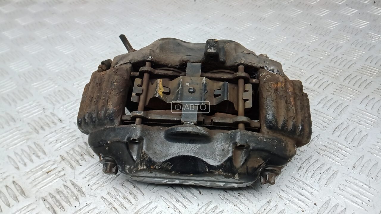 Суппорт тормозной передний левый