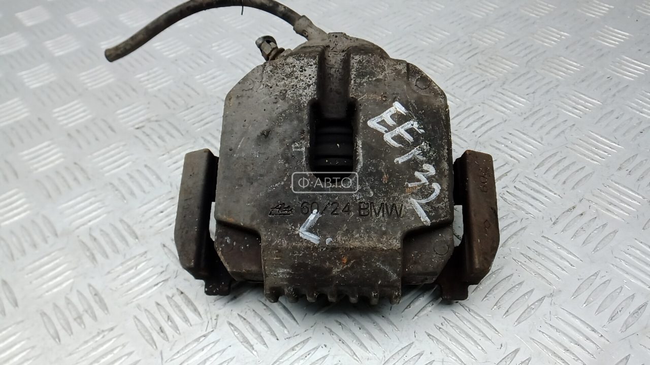 Суппорт тормозной передний левый