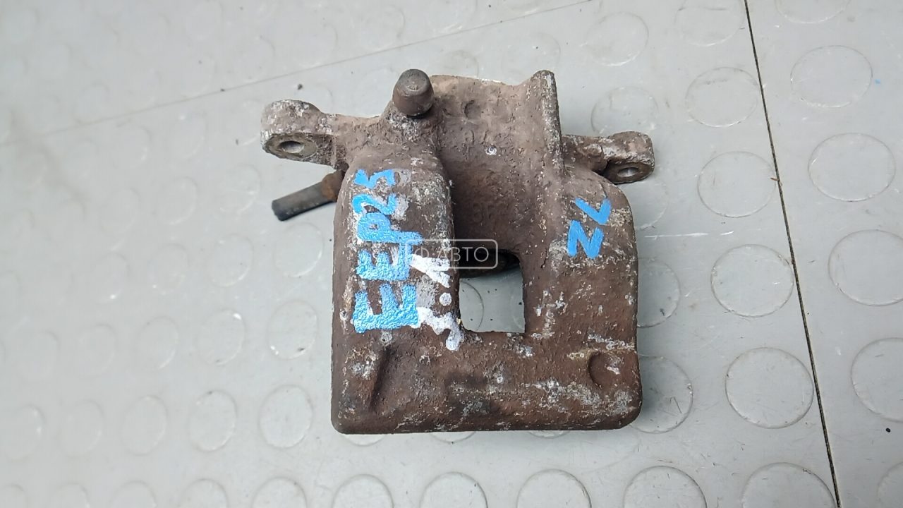 Суппорт тормозной задний левый