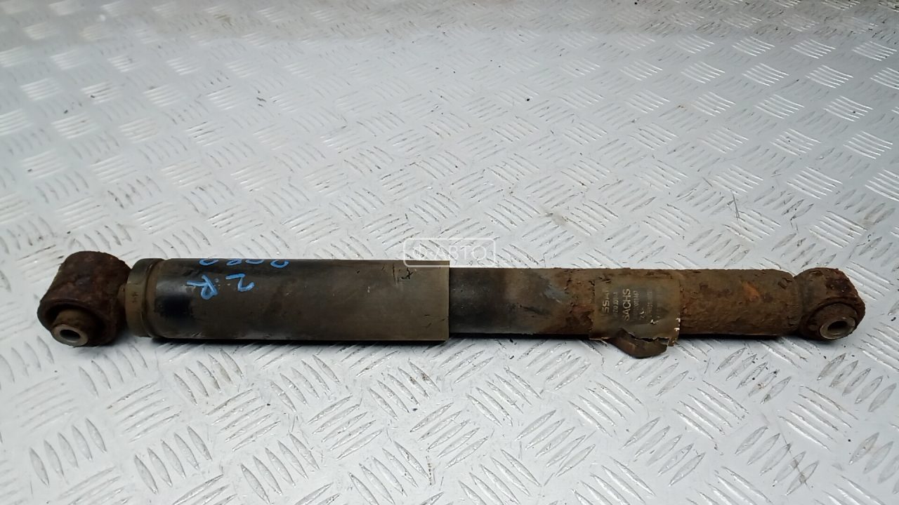 Амортизатор задней балки