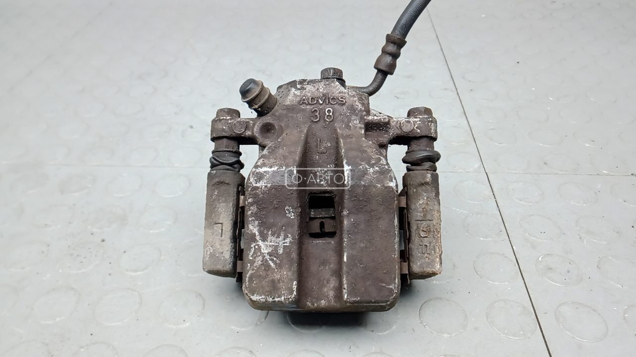 Суппорт тормозной задний левый