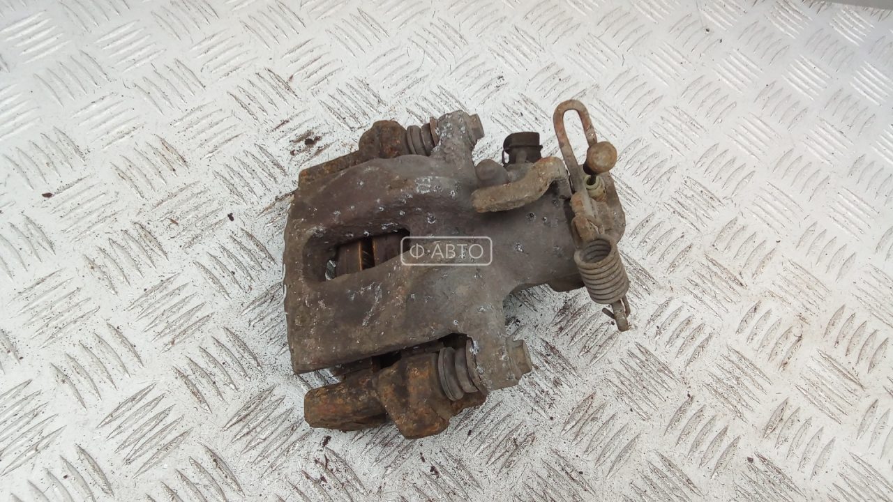 Суппорт тормозной задний левый