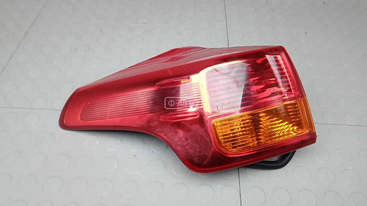 Фонарь задний левый