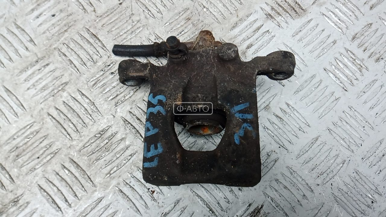 Суппорт тормозной задний левый