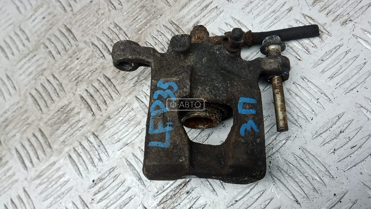 Суппорт тормозной задний правый