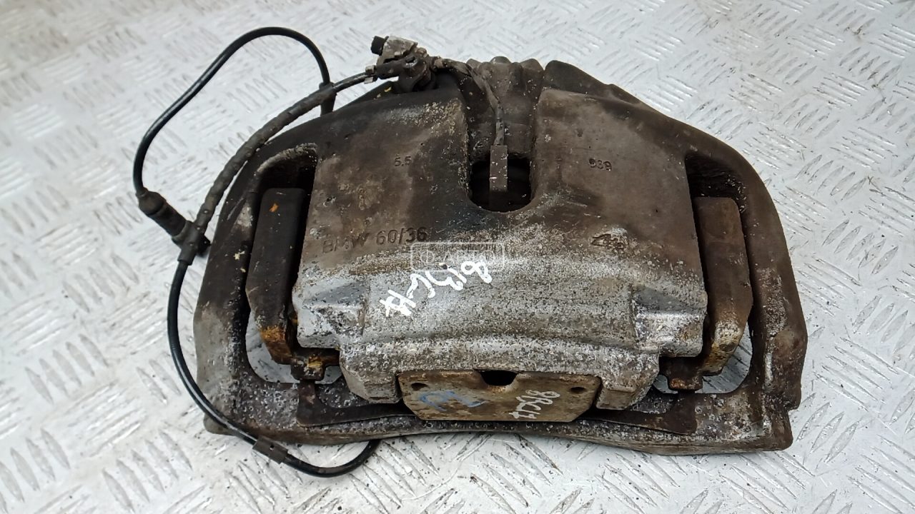 Суппорт тормозной передний левый