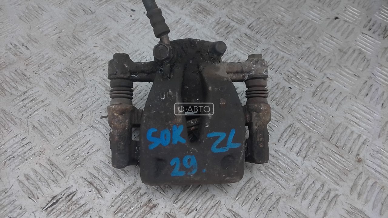 Суппорт тормозной задний левый