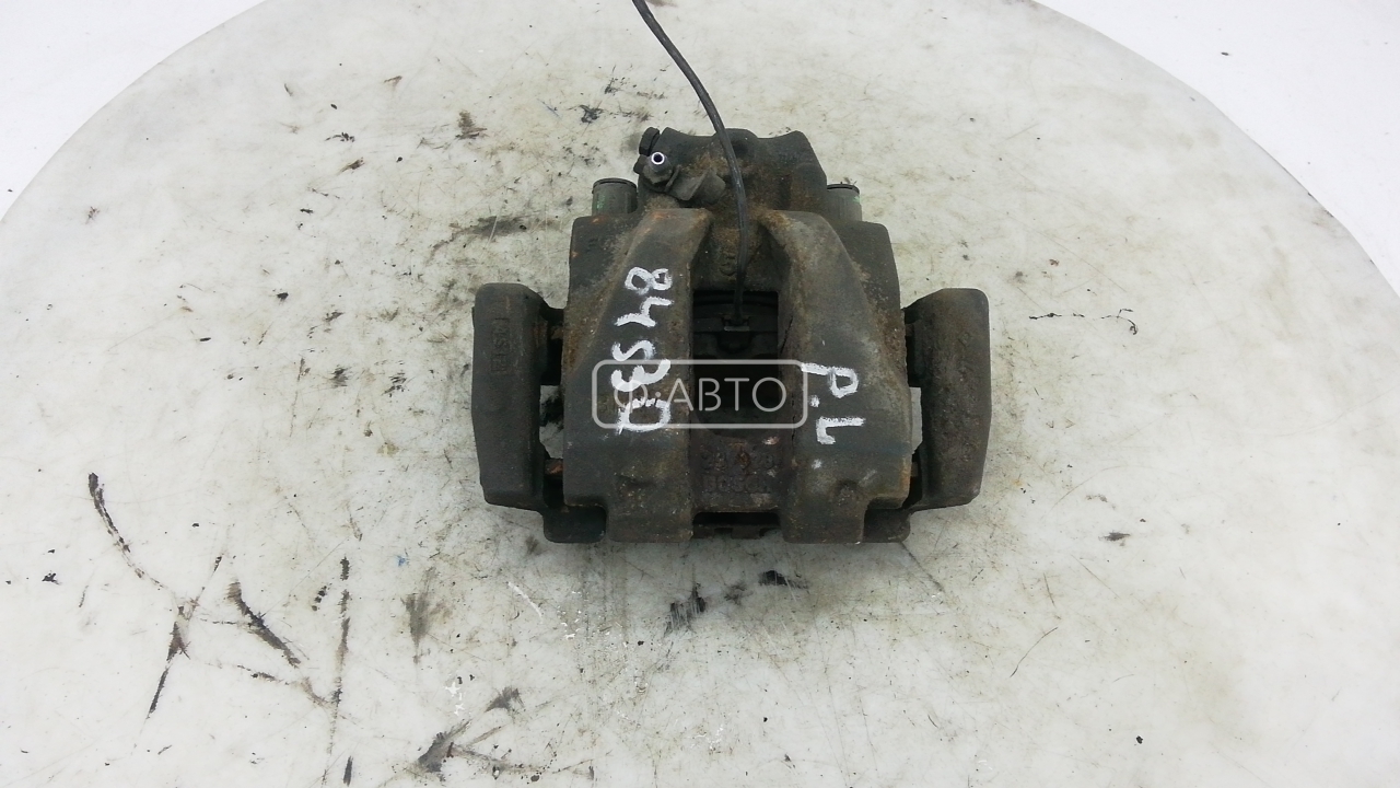 Суппорт тормозной передний левый