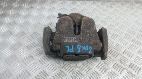 Суппорт тормозной передний левый