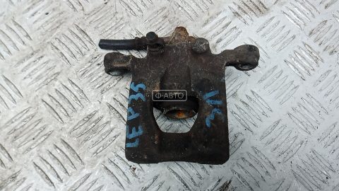 Суппорт тормозной задний левый