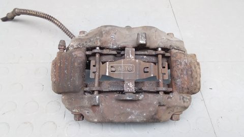 Суппорт тормозной передний левый